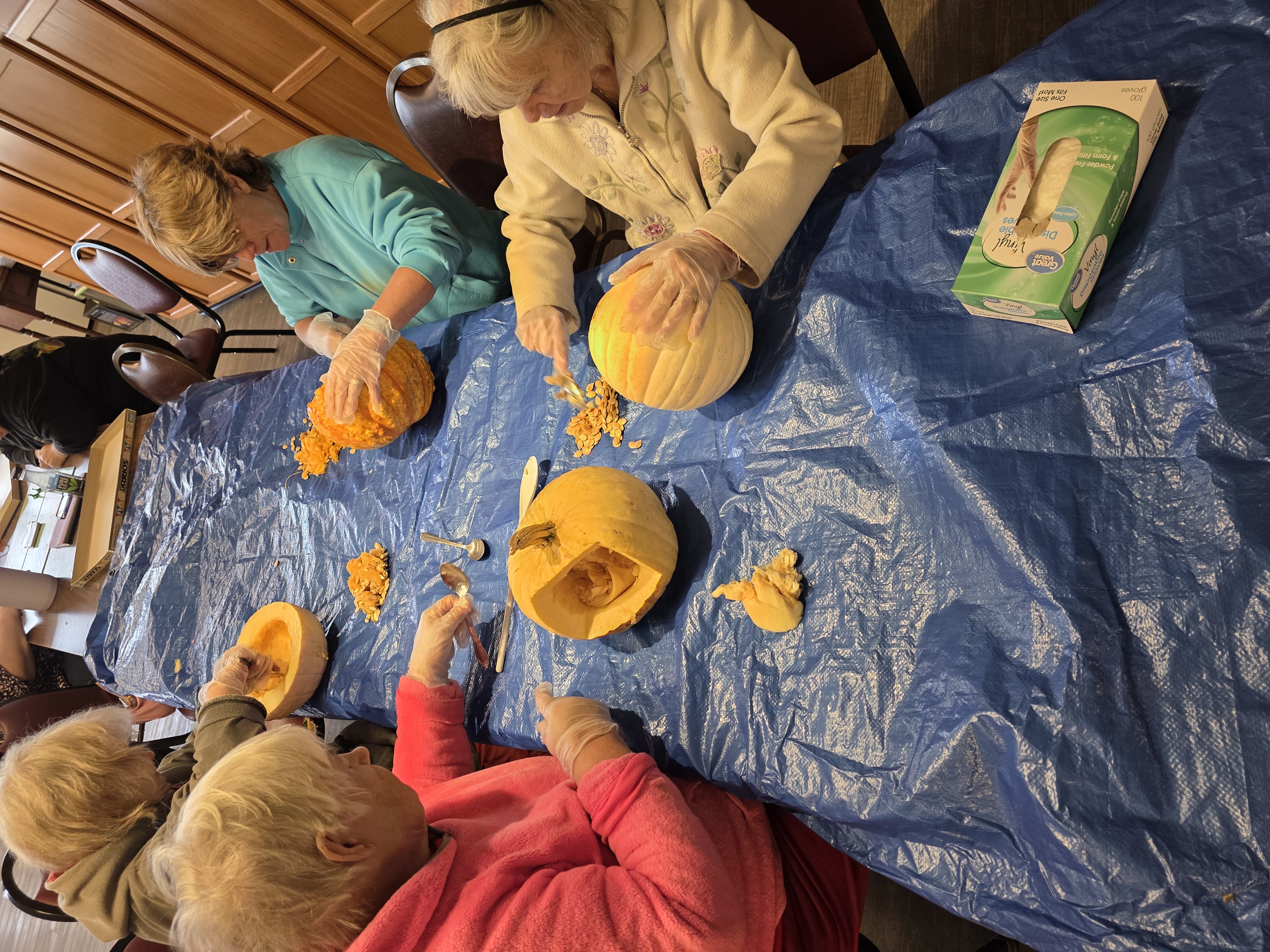 Making birdhouses out of pumpkins